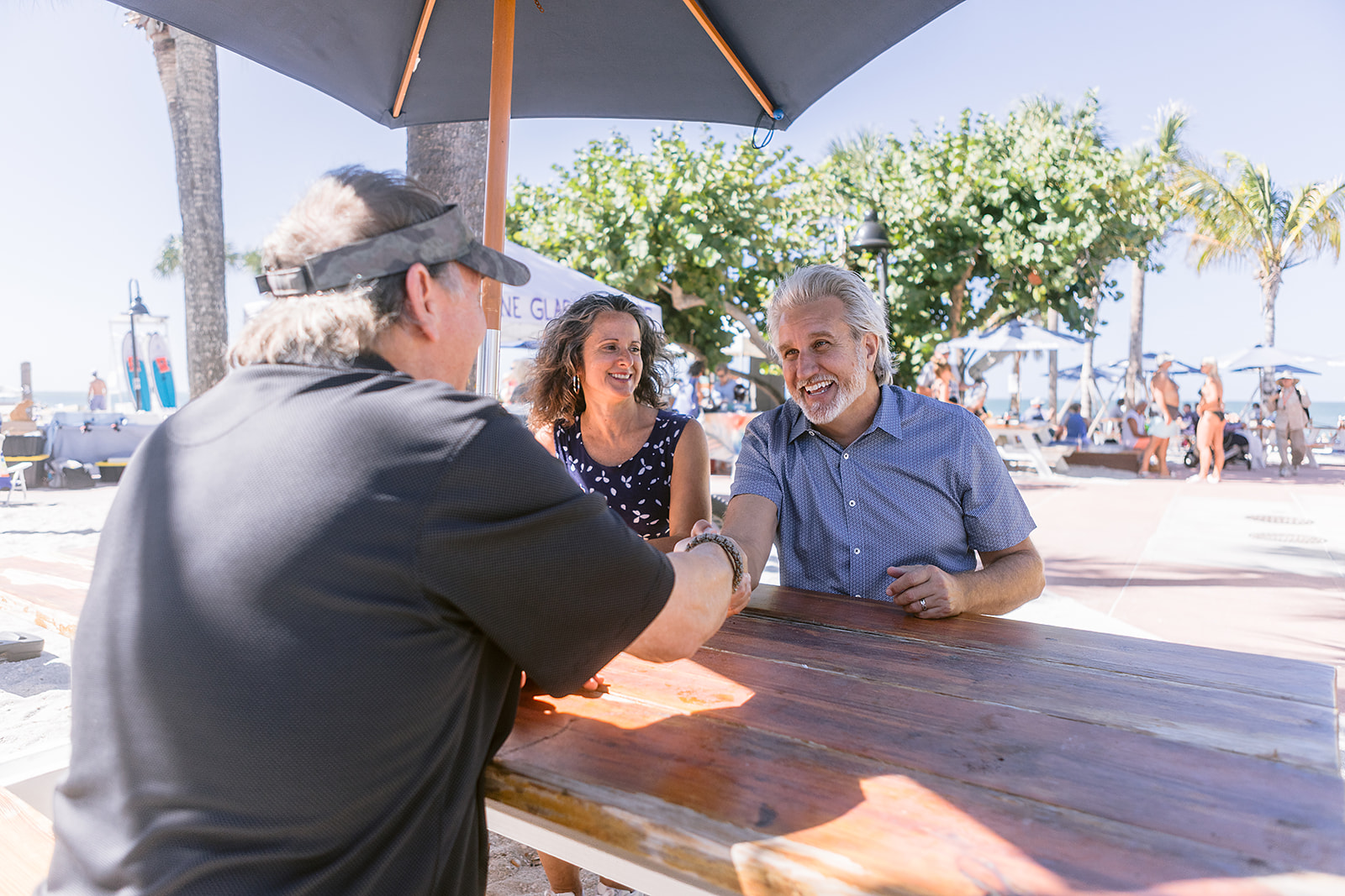 Scott Tate meeting with residents at the beach